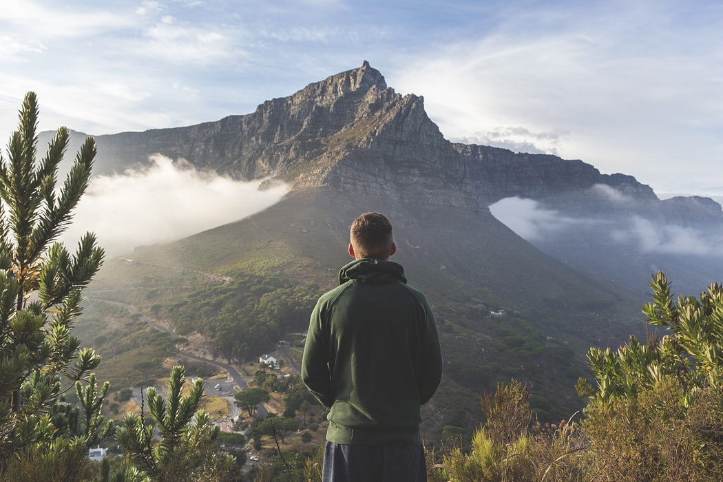 South Africa – Cape Town From the Mountains – Joshua Earle Brightly coloured courtyard with table and chairs
